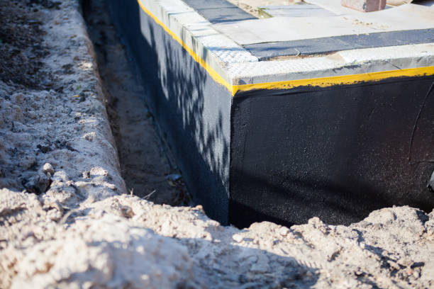 Professional Waterproofing technician working in Adamstown, MD
